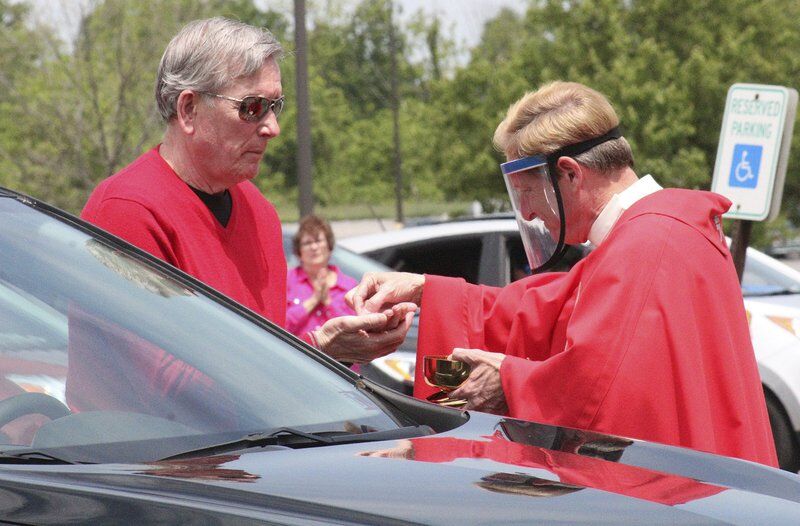Parish celebrates Mass in former Sears parking lot